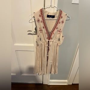 Francesca’s blue rain small cream embroidered dress.